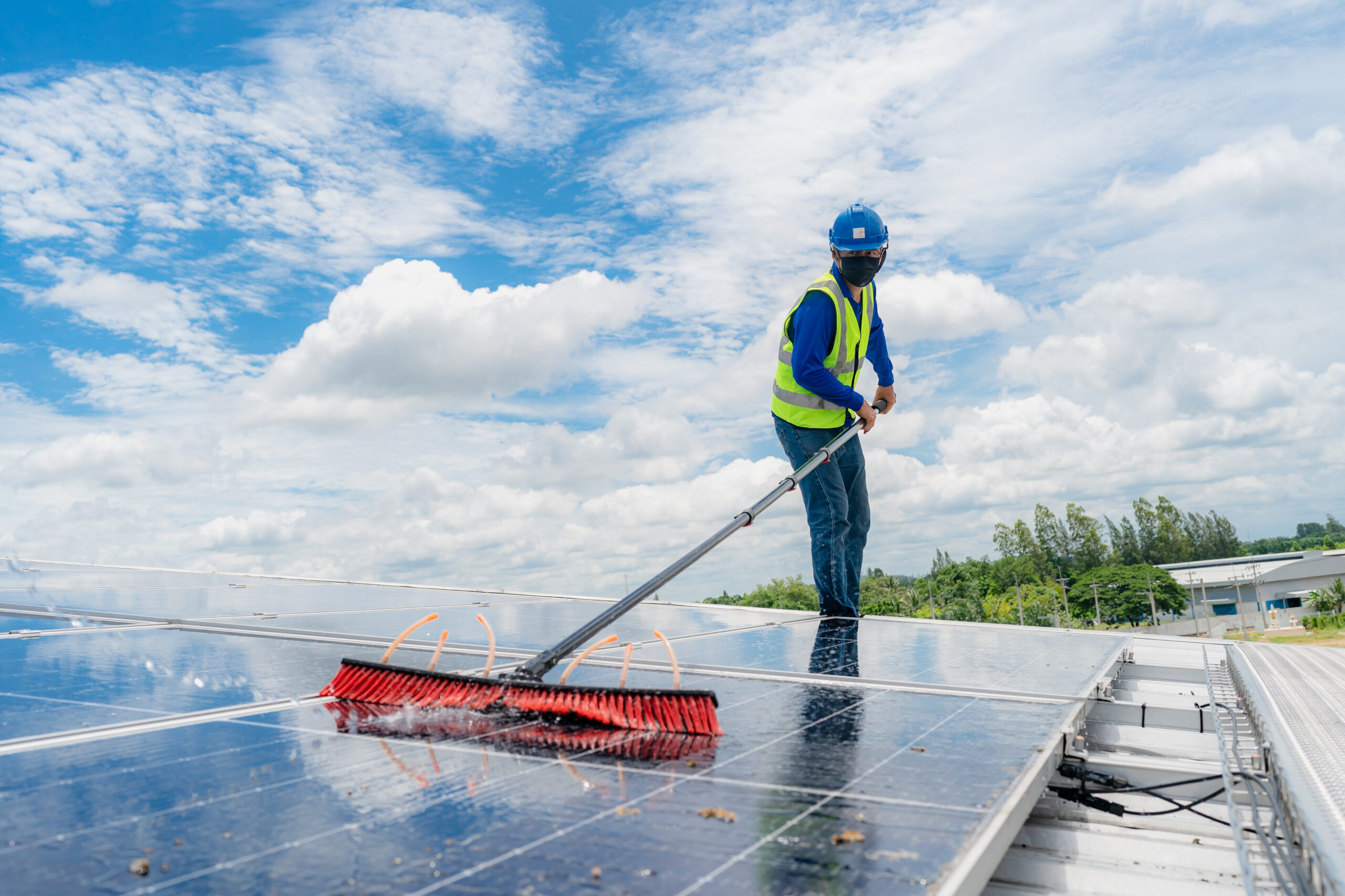 Solar roof cleaning, Professional technicians were washing and the surface of the solar panels